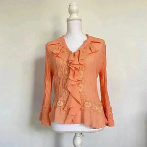 Orange ruffle button down long sleeve.